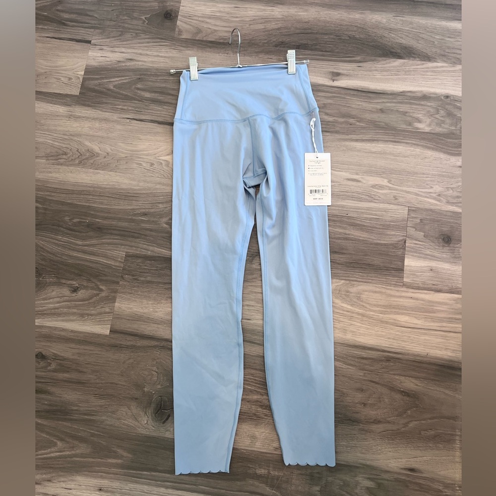 NWT Tavi Light Blue Leggings with scalloped edging. Sz M.